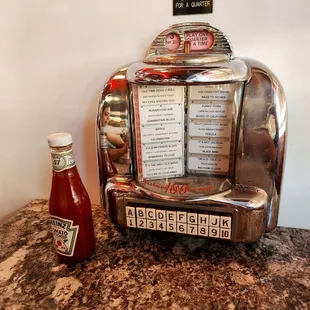 You can choose 3 songs to play on their jukebox for a quarter!