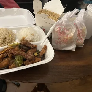 Light Dinner - comes with crabragoon, eggroll and small drink. Main portion is orange chicken with fried and steamed rice on the side.