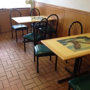 Two tables for eat in dining.