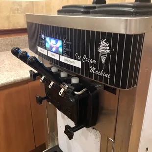 an ice cream machine in a kitchen