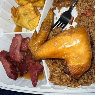 Ribs, chicken wings and rice.