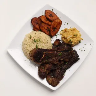 Dibi (Grilled Lamb) Platter with Rice, Plantains, and Grilled Onions