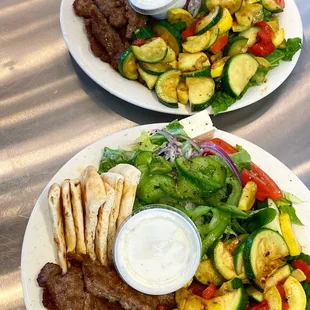 two plates of food on a table