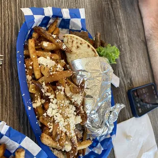 a plate of fries and a sandwich