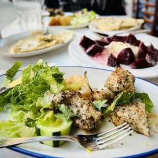 Our helpful and friendly server loaded our table with lots of plates full of yummy food