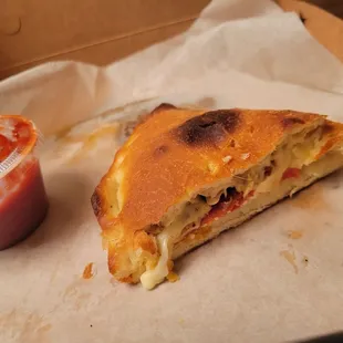 Calzone with Gyro Chicken and pepporini.