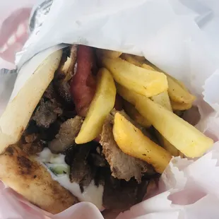 Pork Gyro Pita Sandwich - served with fries inside pita