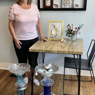 One of our most popular local artists, posing with some of her creations! "Ruthanne"