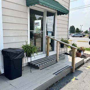 Enter from our parking lot, located behind the building