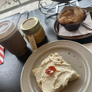 Focaccia bread, raspberry beret coffee, apple muffin, and local homemade candle I bought in their shop