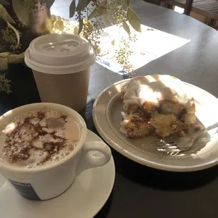 a plate of food and a cup of coffee