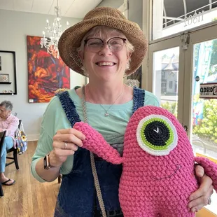 Cece pictured with her new "support monster"  Locally crafted by Jamie of Willow Rose Creations