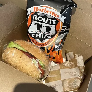 a sandwich and chips