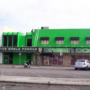 a motorcycle parked in front of a building