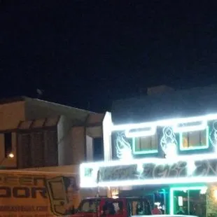 a truck parked in front of a building