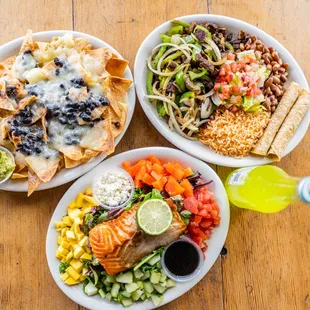 three plates of mexican food