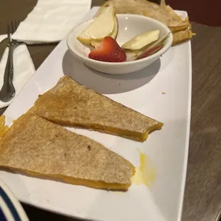 Kids quesadilla with fruit and vegan cheddar cheese