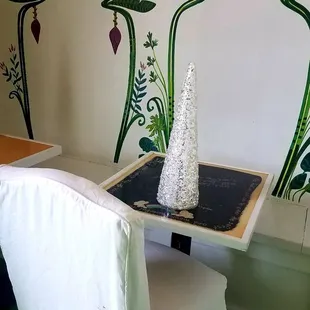 a white chair and a table