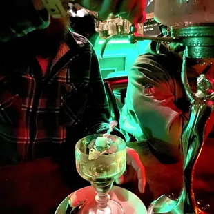 Pouring the water over the Absinthe
