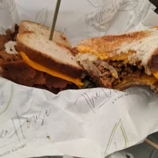 Vegan reuben sandwich, less a bite