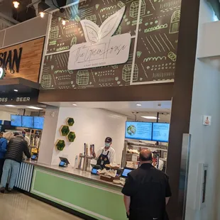 a man standing in front of the counter