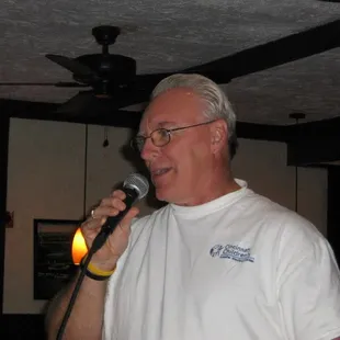 a man speaking into a microphone