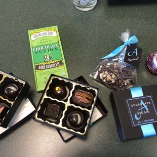 Three boxes of truffles. Tea infused chocolate bar. Scottish Egg. Assorted barks.