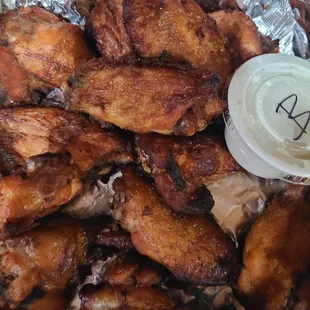 a plate of chicken wings