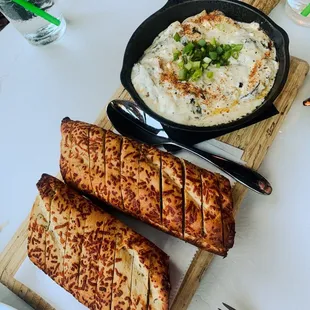 a plate of food and a skillet