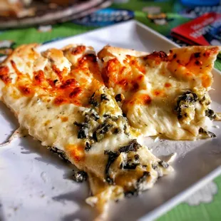 The White Owl pizza. Very good flavor. Thin crispy crust. One of the best white pizzas I've ever had.