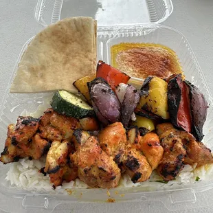 Chicken Kabob(dark meat) plate with hummus, garlic sauce, and pita bread
