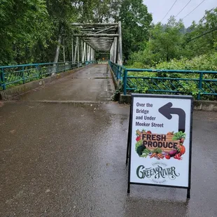 a sign on the side of the road