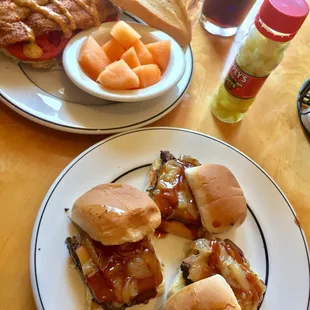 Blackened catfish po boy (back) and beef brisket sliders (front) and the pepper sauce