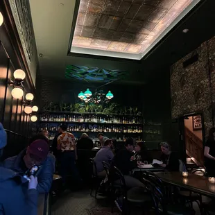 people sitting at the bar