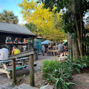 The grill/food is the blue tent all the way in the back