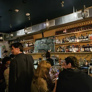 people sitting at a bar