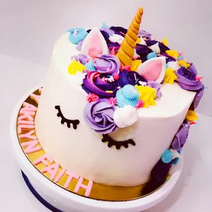 a cake decorated with a unicorn