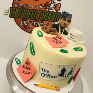 a cake with a man and woman on it