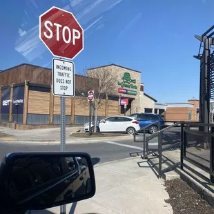 a stop sign on a street corner
