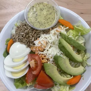 Sunshine salad with tuna protein and poppy seed dressing
