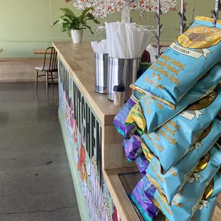 a counter with a bunch of tea bags on it