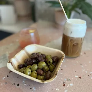 Guava lemon spritzer, olive plate, and pistachio cold brew. Delicious!