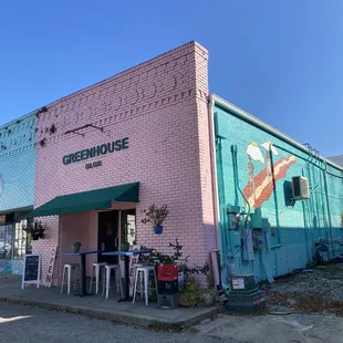 Iconic pink brick wall of Greenhouse Biloxi