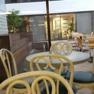 tables and chairs in a cafe