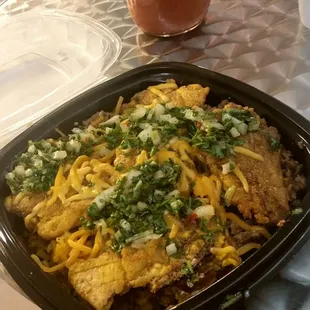 Now serving Spanish Bowls. This was yellow rice, black beans, picadillo, tostones, cheese and chimicuri sauce. It was also delicious!
