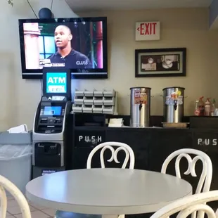 a view of a television and a coffee machine