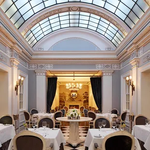 a dining room with a skylight