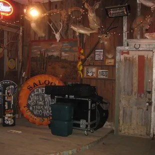 a bar with a lot of signs
