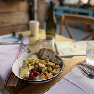 Omelette with sausage Swiss cheese mushrooms end it was excellent