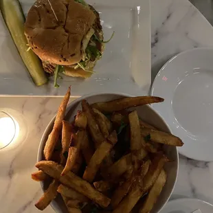 Chicken cordon blue sandwich and fries
